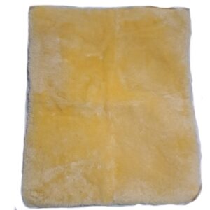 A rectangular piece of Medical Sheepskin . OZwool Australian Sheepskin