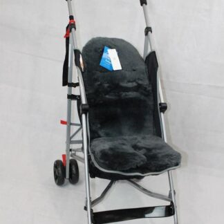 charcoal-colored lambskin stroller liner with a soft and plush texture,